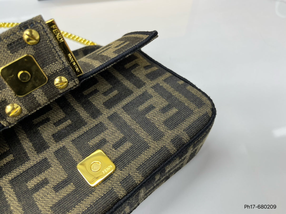 A Fendi baguette that you carry under your arm crossbody bag